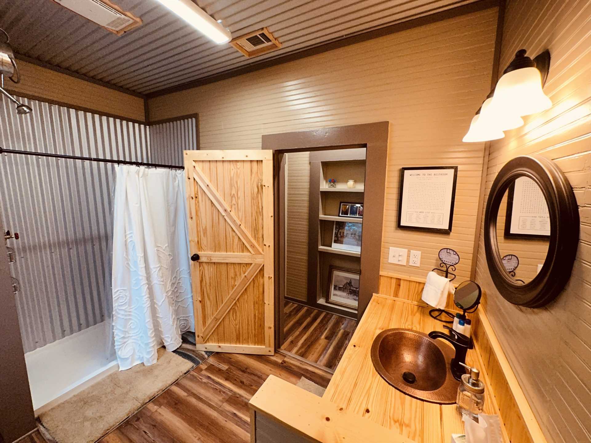                                                 Another highlight of the full bath here is the spacious and neat-as-a-pin shower stall!