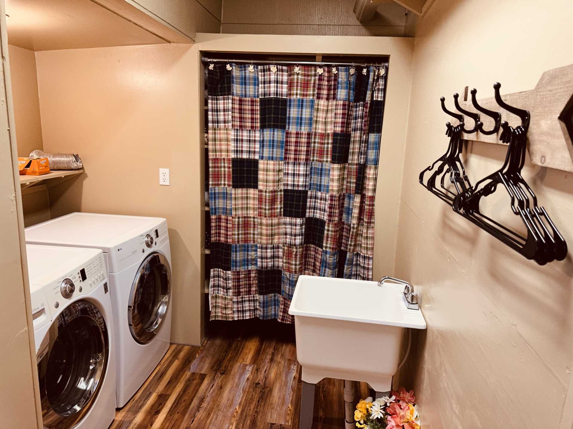                                                 The utility room features a washer and dryer combo and industrial sink. No need to take dirty laundry home after your holiday!