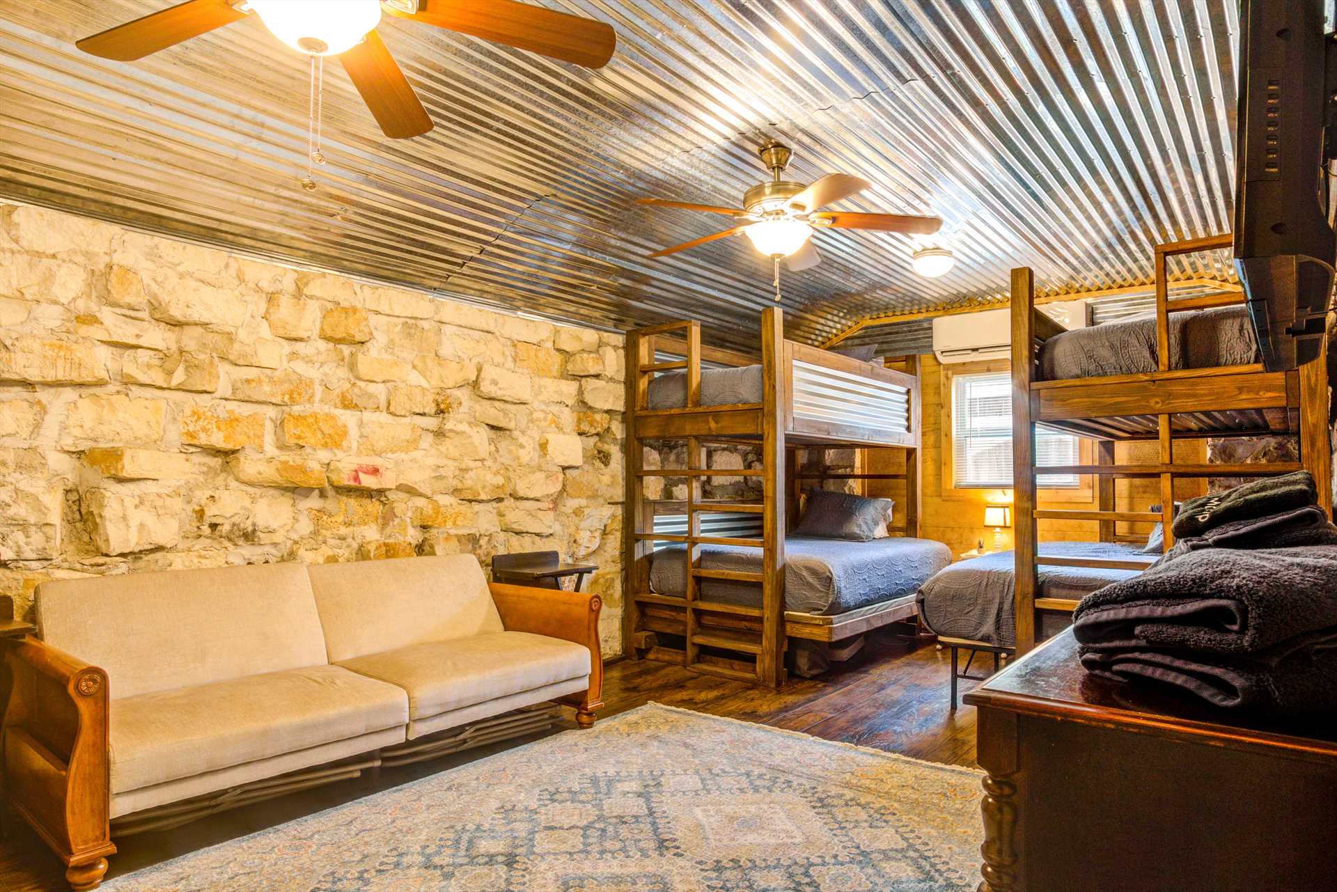                                                 Up to eight of your group can rest in the bunkhouse. Kids (and the young at heart) love the bunk bed setups!
