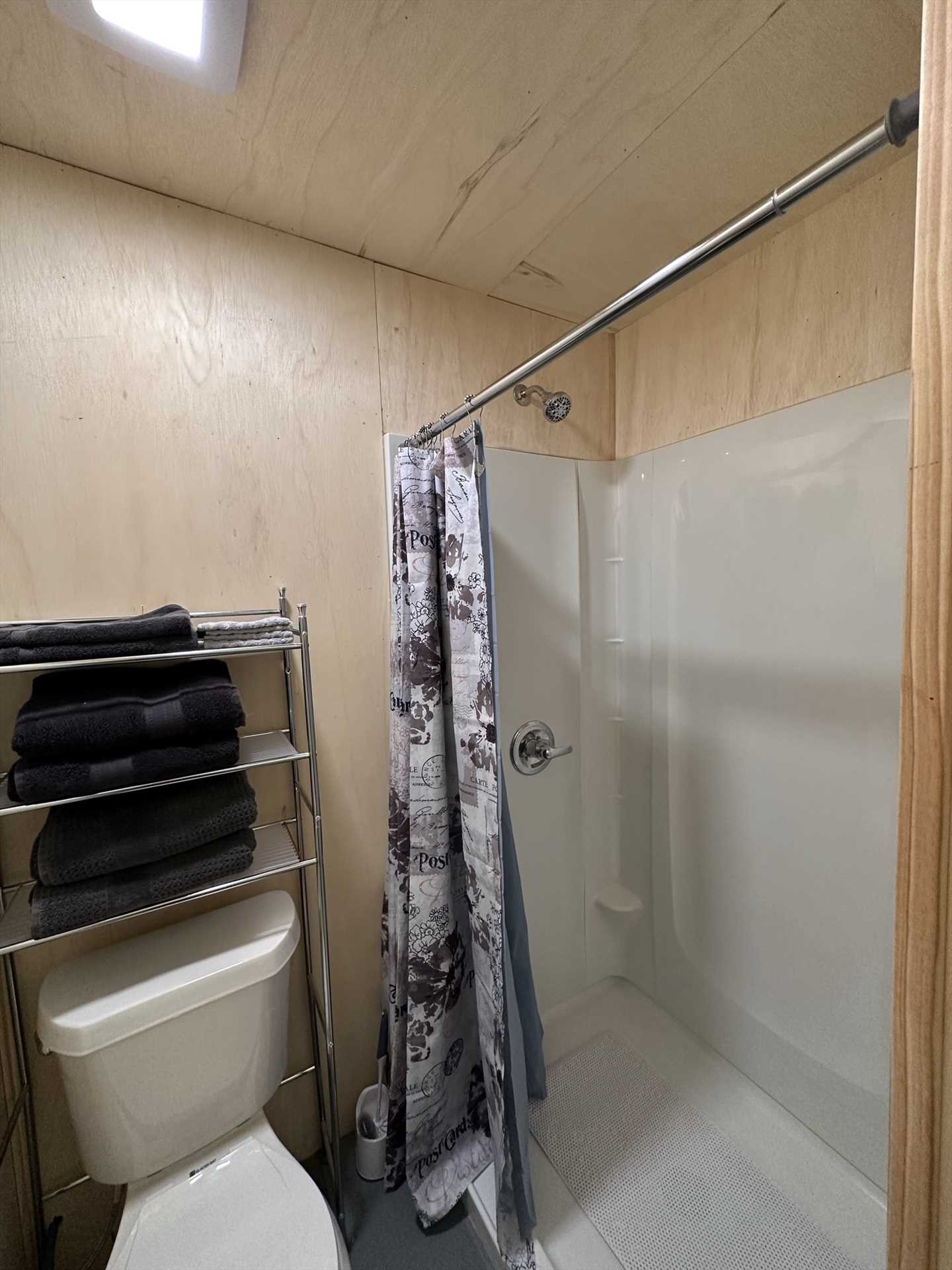                                                 There's a roomy shower stall here, and there are even laundry facilities available when you book a longer stay!