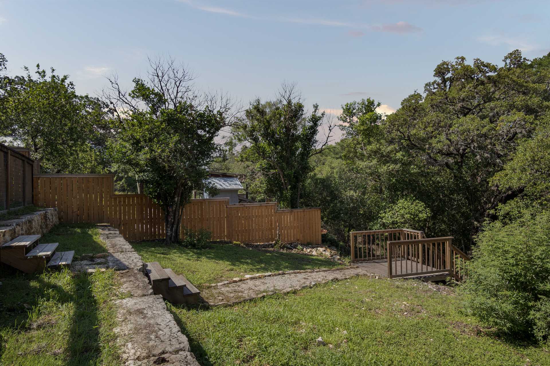                                                 A staircase has been conveniently built for access to the Medina River from the house.
