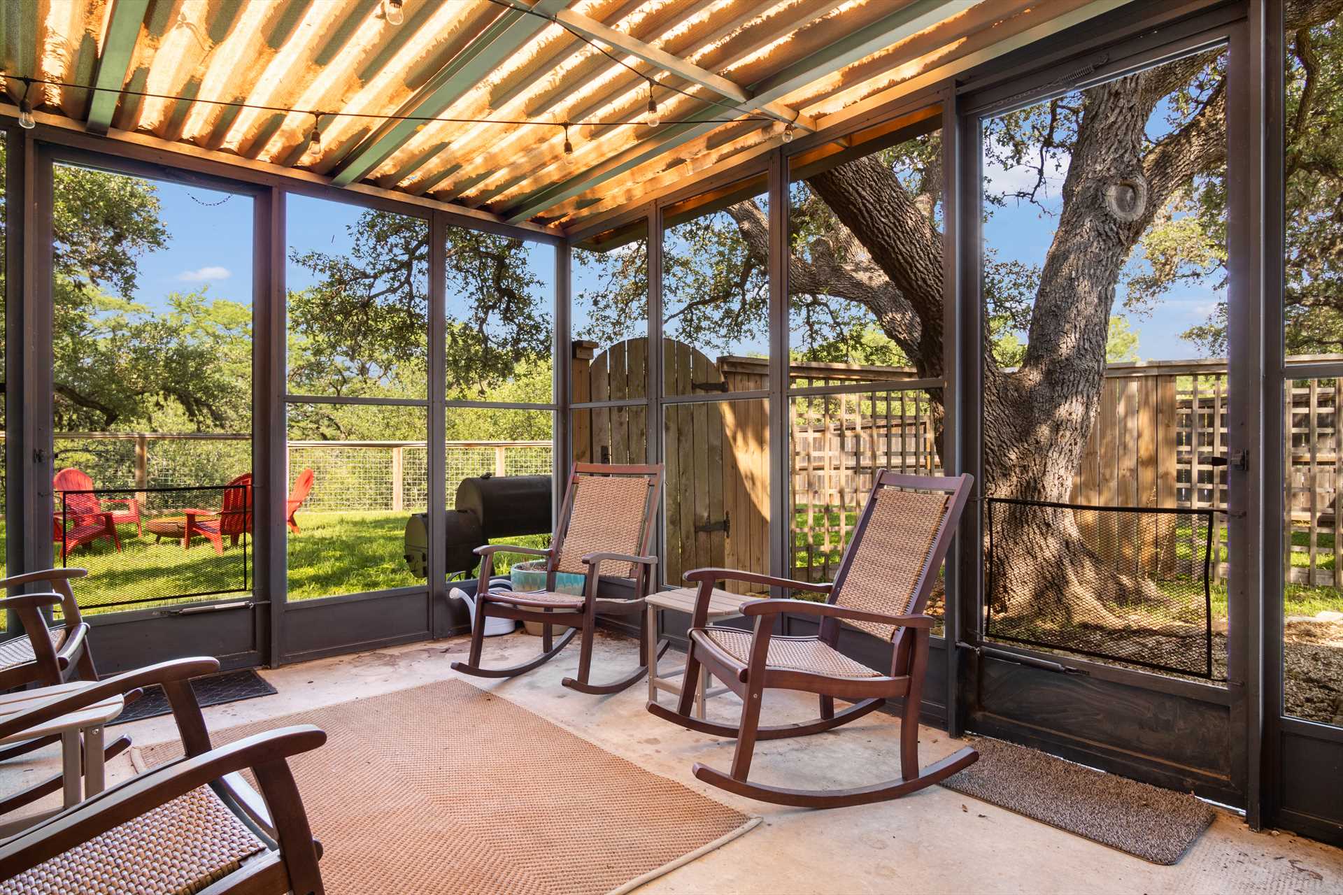                                                 The screened porch lets the Hill Country breezes in while keeping the critters out!