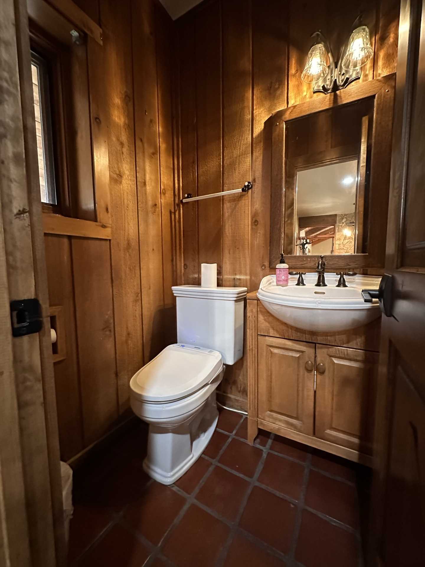                                                 You'll find an additional half-bath downstairs for your convenience!