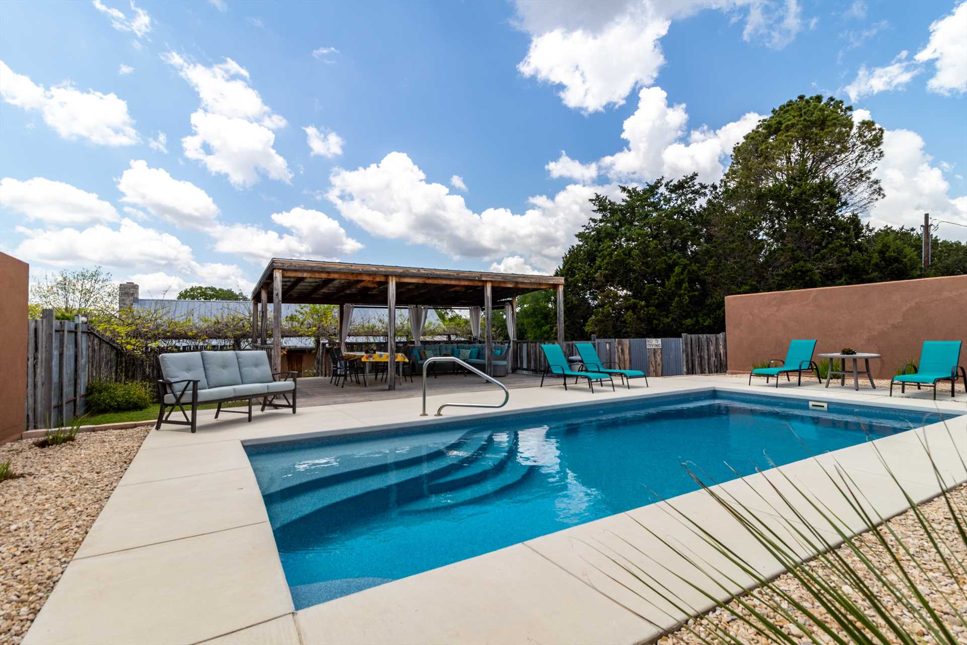                                                 Whether you'd like to lounge in the sun's rays, or you'd prefer a shadier spot to kick back, the pool area is nicely set up with both!