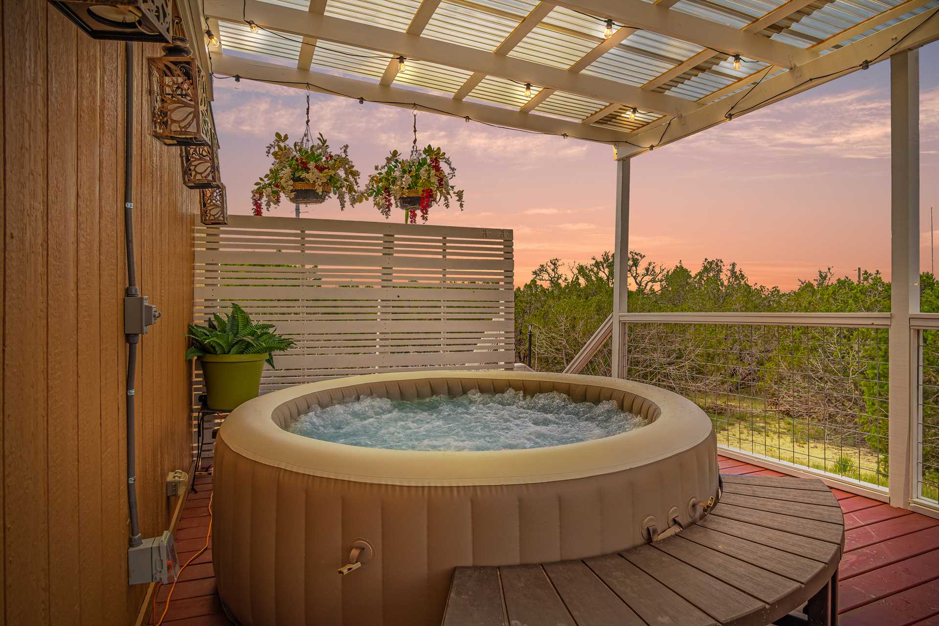                                                 The bubbling and soothing hot tub seats four, and presents a ringside seat for inspiring Hill Country views.