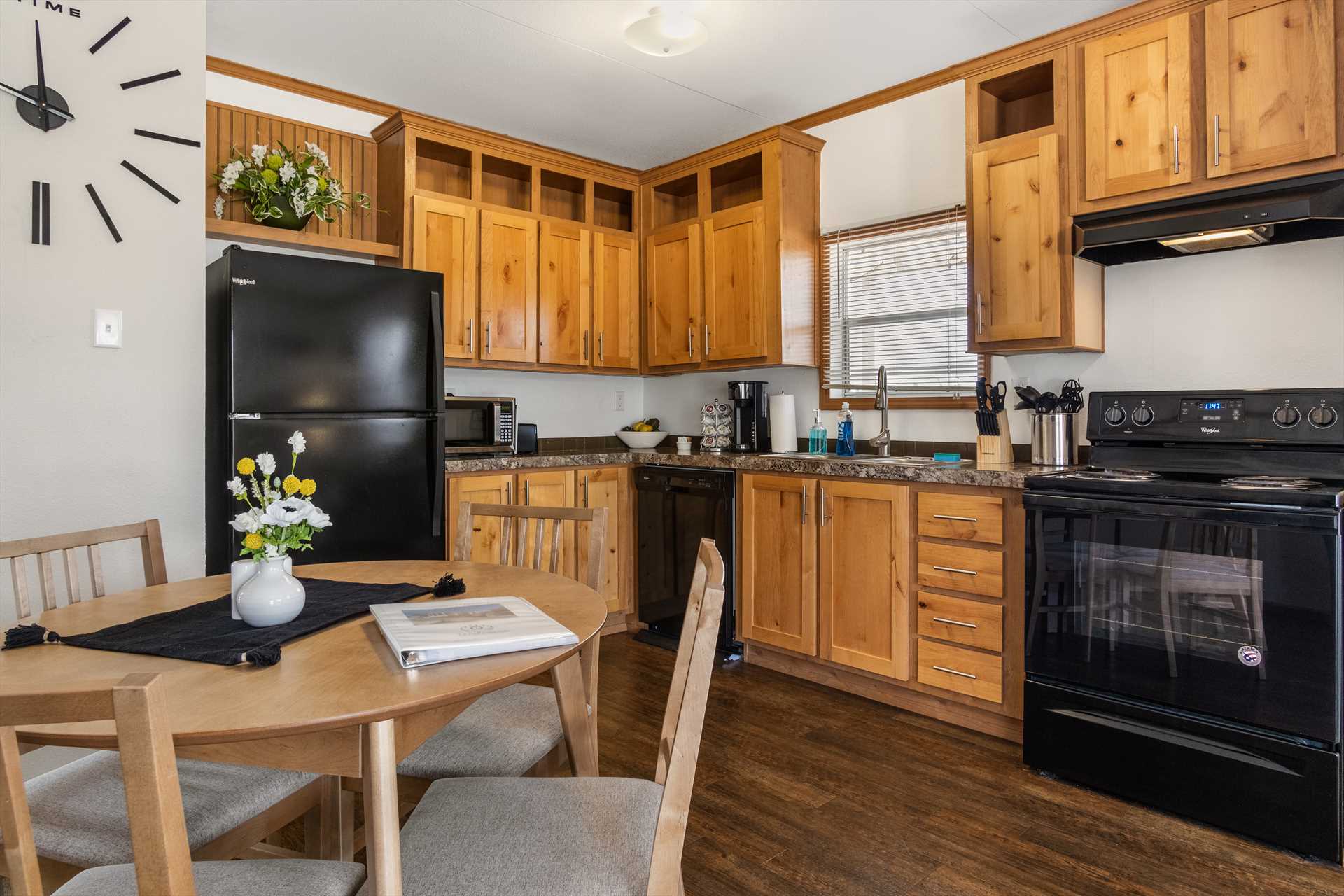                                                 The kitchen at Hill Country Memories is well-appointed, with appliances, cooking and serving ware, and even complementary coffee!