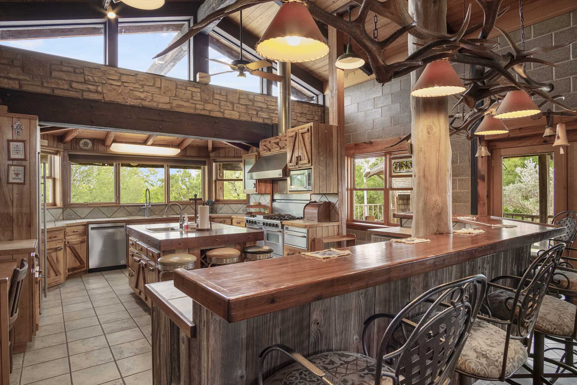                                                Bar stool seating marks the gateway to the Lodge's full country kitchen!