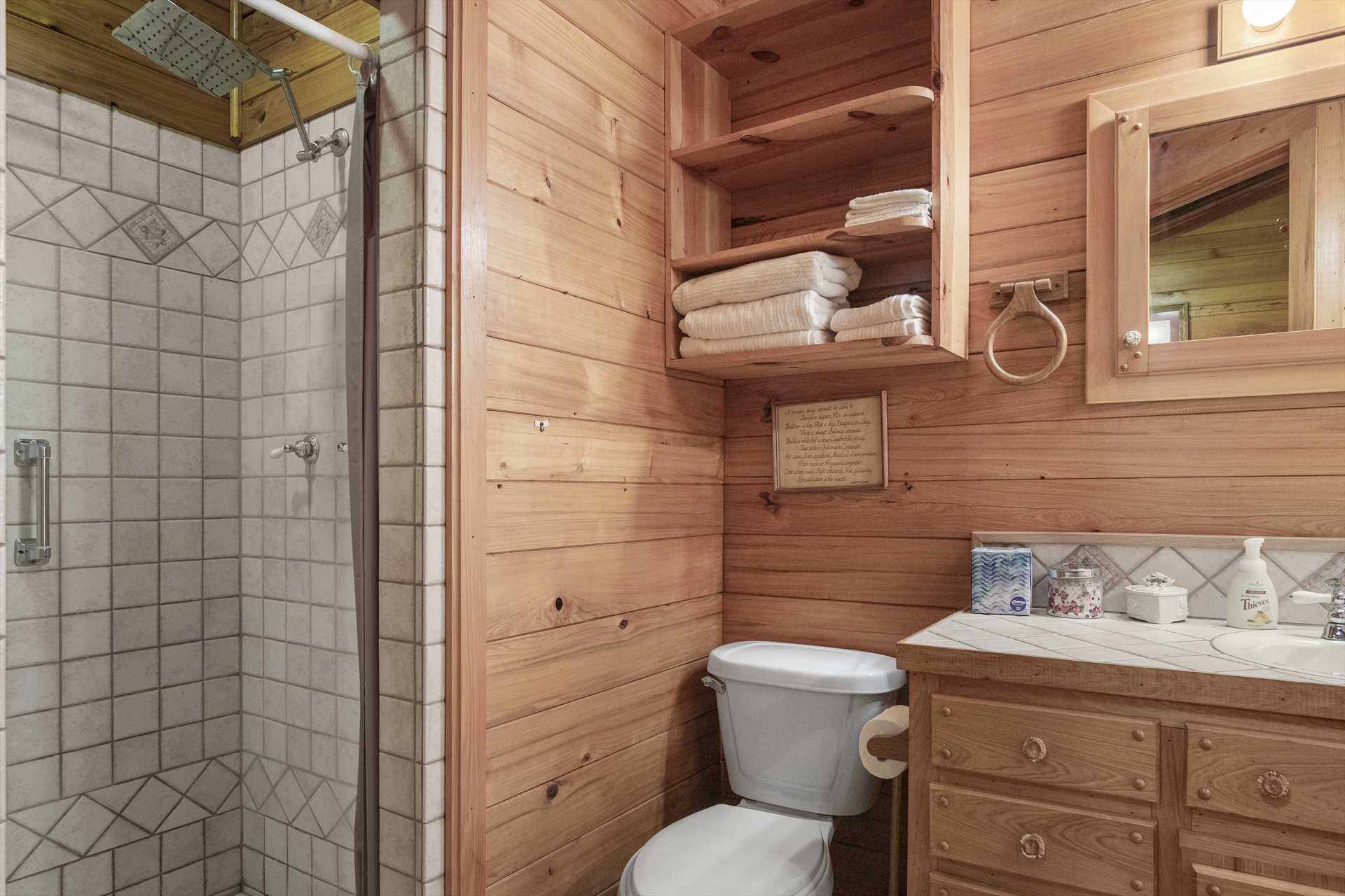                                                 Clean linens and a spotless shower stall make cleanup a breeze in the Whitetail Room bath.