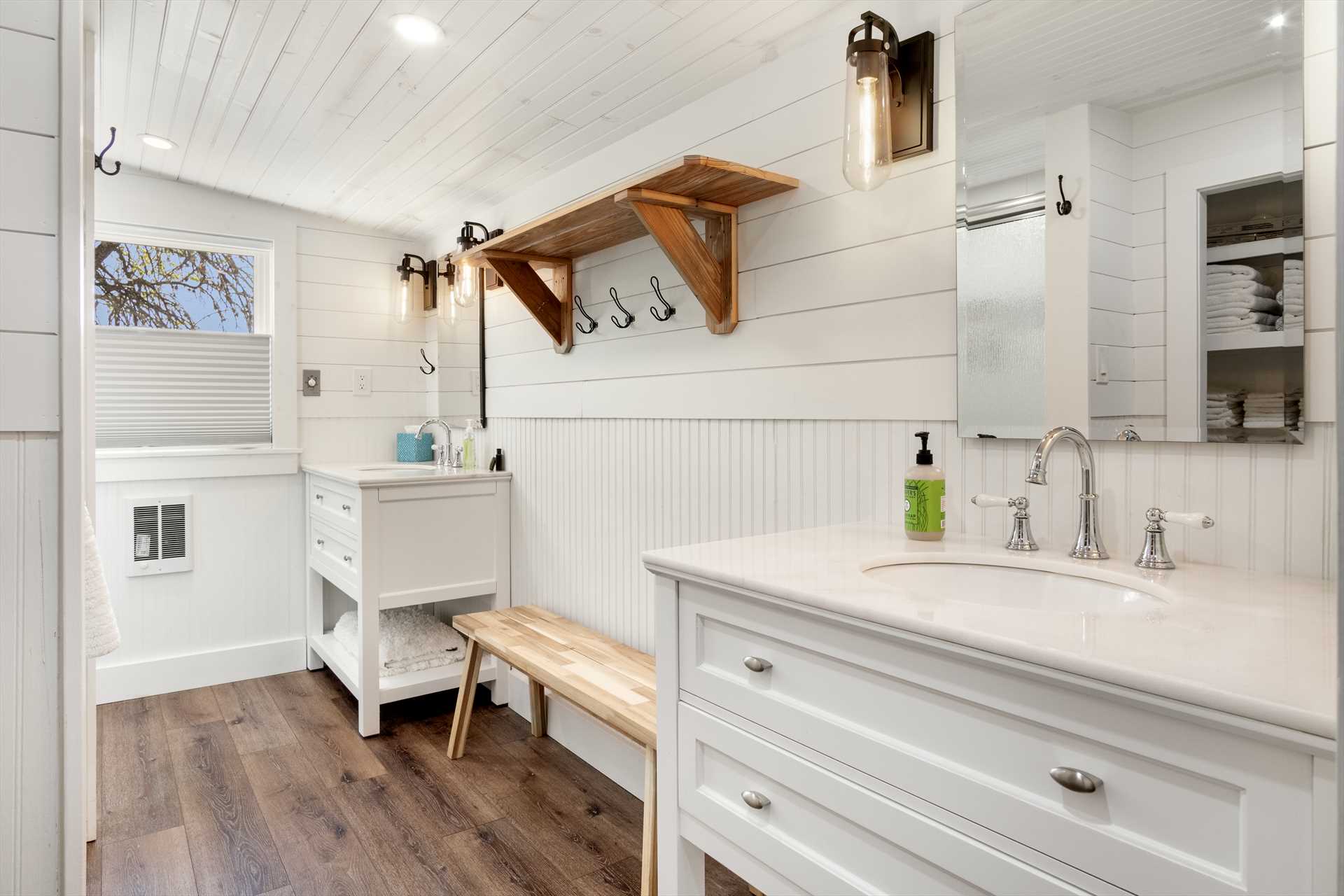                                                 You'll enjoy the full master bath, which includes fresh linens and a dedicated sit-down changing area.