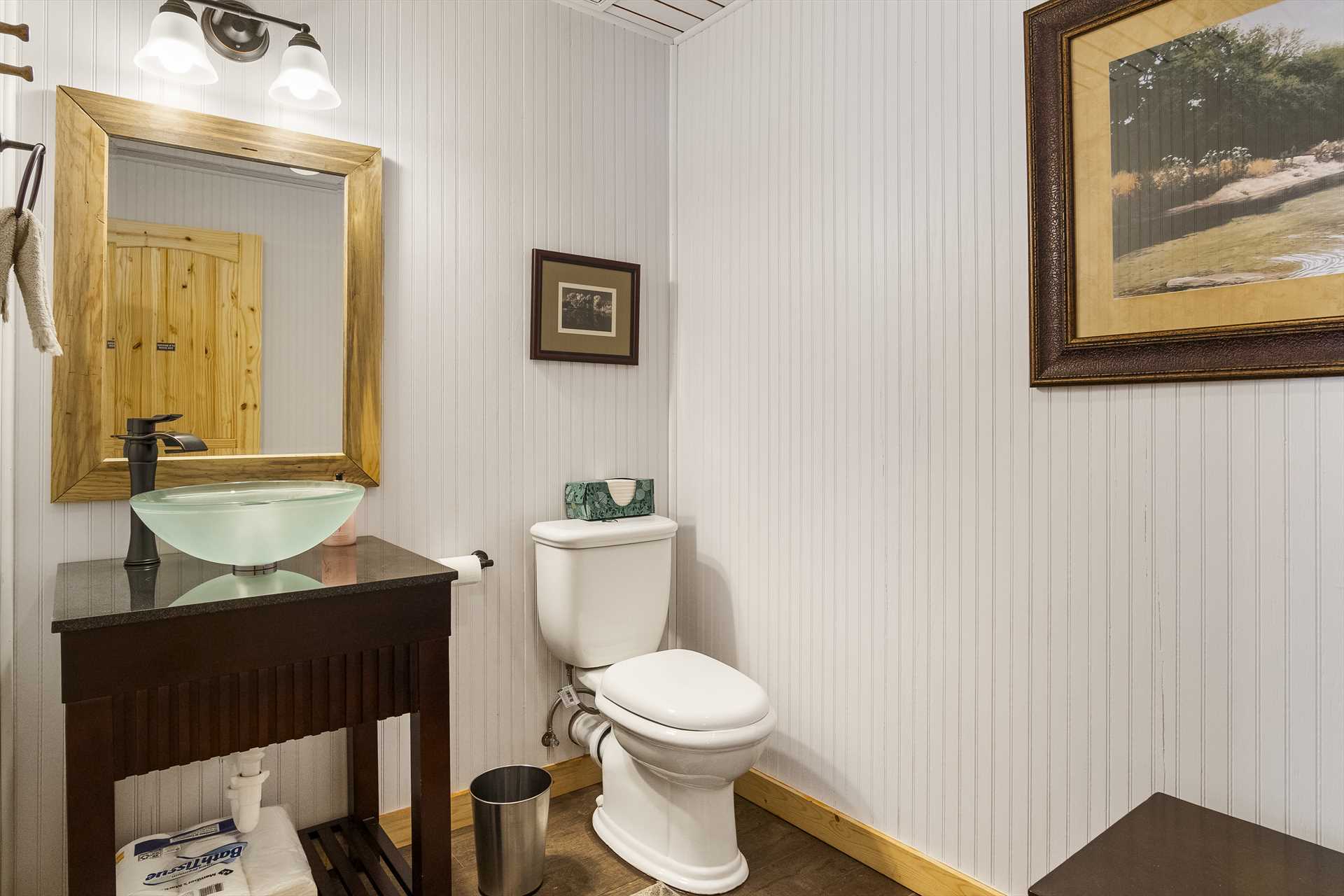                                                 For your convenience, there's a sparkling-clean half bath on the cabin's lower level.