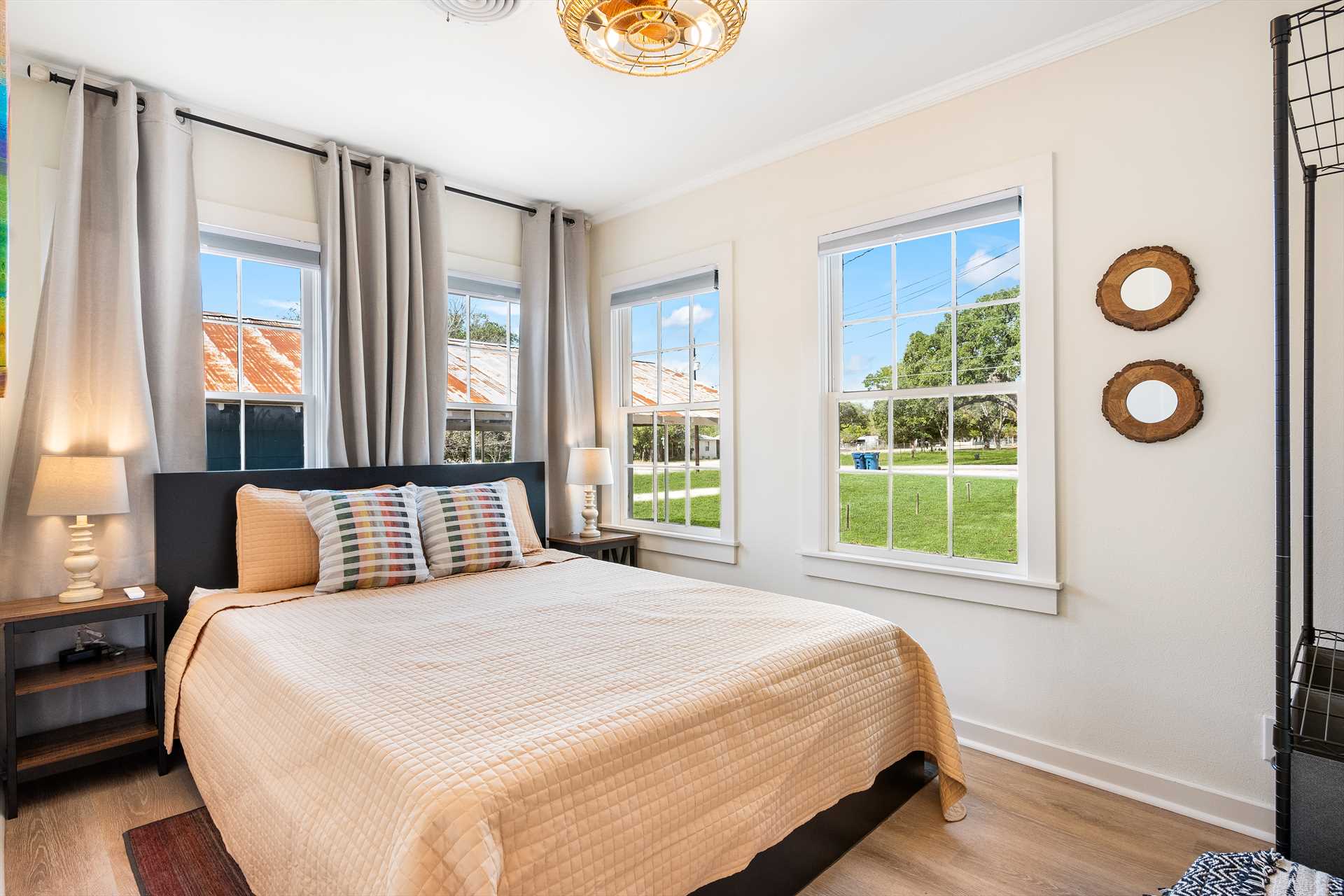                                                 Lots of natural light pours into the second bedroom, and there's sweet slumber for two on its queen-sized bed!