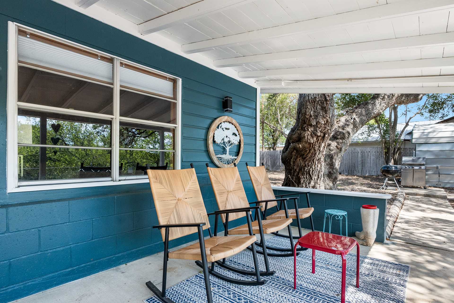                                                 The rocking chair corner of the porch is a great place to sip morning coffee, or cap off your Hill Country day with a glass of wine.