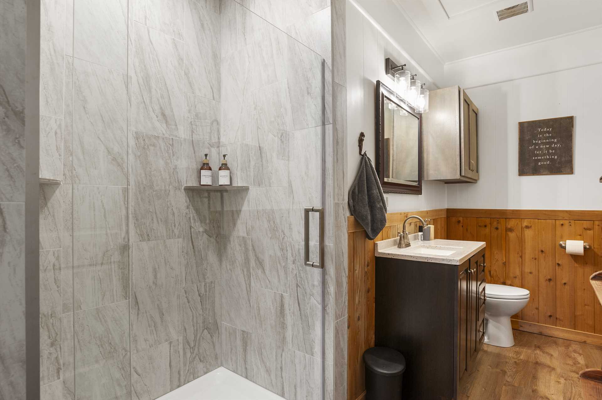                                                 Both bedrooms at A Place on Pecan have an accompanying full bath with roomy glass-walled shower stalls!